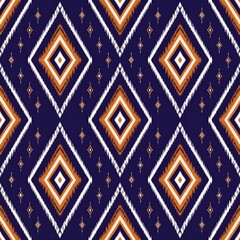Symmetrical repeating diamond pattern with intricate orange, white and blue details. Bold, geometric textile design