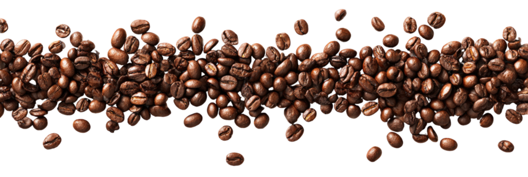 Coffee beans scattered across a dark background