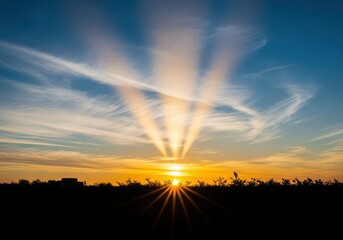 Dramatic sun rays bursting through clouds at sunset isolated on white background