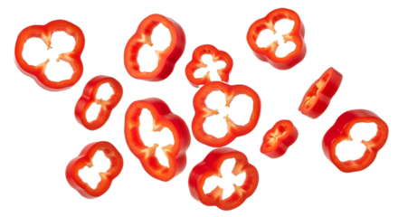 Scattered slices of fresh red bell pepper on transparent background