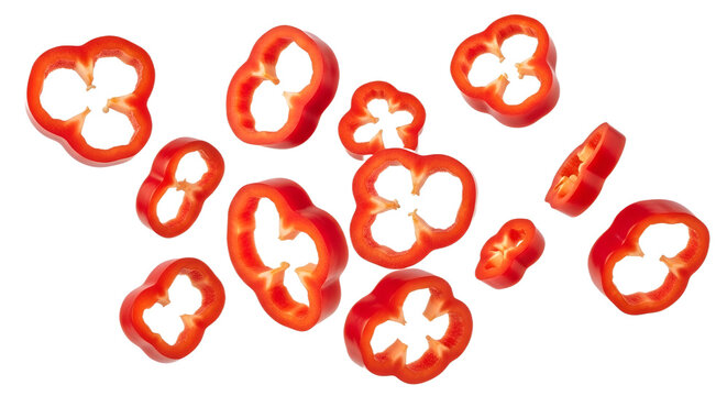 Scattered slices of fresh red bell pepper on transparent background