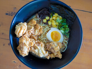Delicious Japanese Ramen Bowl with Fried Chicken and Soft boiled Egg