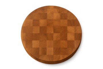 Round end grain cutting board featuring a checkerboard pattern. Perfect for food preparation and culinary concepts. Transparent background