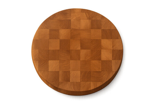 Round end grain cutting board featuring a checkerboard pattern. Perfect for food preparation and culinary concepts. Transparent background