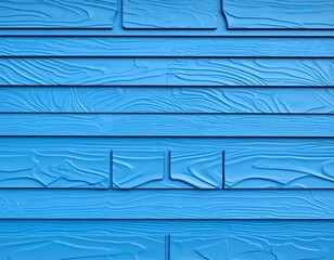 Close-up of blue textured siding, arranged horizontally