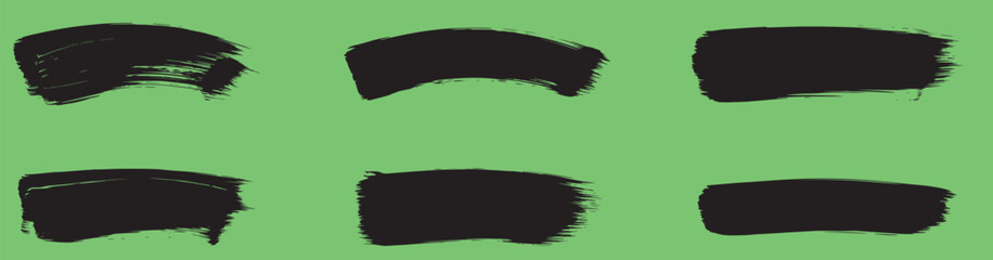 Collection of six black brush strokes on a green background, ideal for adding a touch of artistic expression to your projects, creating unique textures, or highlighting specific areas