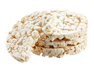 Close-up of a stack of light, puffed grain cakes, one broken