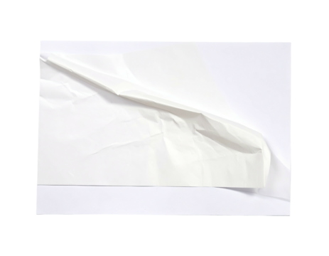 Close-up of a white paper corner slightly peeled back, with wrinkles and folds