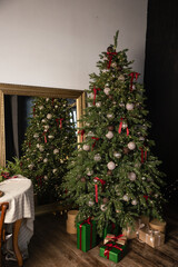 a room decorated for Christmas, a festive atmosphere