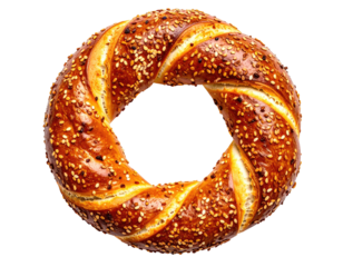 A freshly baked, sesame-seed covered, circular bread roll with a hollow center