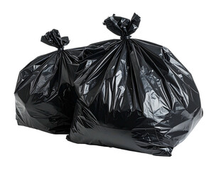 Two tightly knotted black plastic refuse sacks, slightly overlapping, against a void