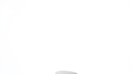 Floating, gray disc slightly rotated on clean white backdrop, soft shadows - Powered by Adobe