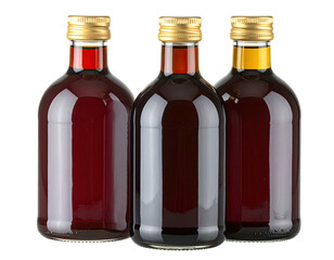 Three small glass bottles with golden lids filled with reddish and yellow liquids