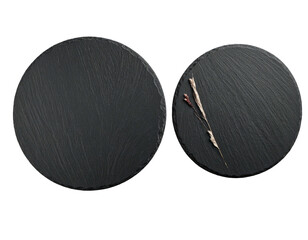 Two round, textured, dark grey stone serving boards with dry botanicals
