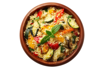 Wooden bowl filled with fluffy couscous, roasted zucchini, peppers, carrots, and herbs on isolated white transparent background