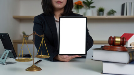 Lawyer Presenting Tablet with Blank Screen in Office