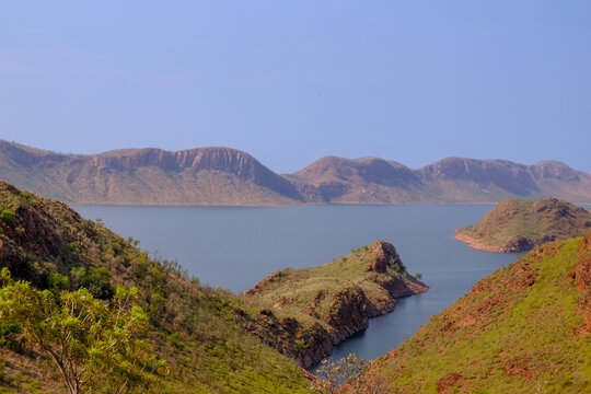 View of Lake Argyle surrounded by green hills