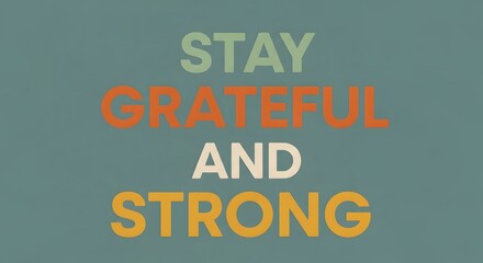 Inspirational quote graphic with the message 'Stay Grateful and Strong' in bold, colorful letters on a calming background to motivate positivity and resilience