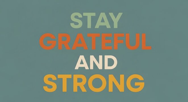 Inspirational quote graphic with the message 'Stay Grateful and Strong' in bold, colorful letters on a calming background to motivate positivity and resilience