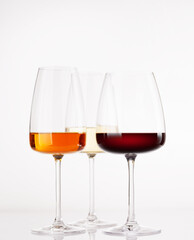 Fototapeta premium Different wine glasses on white background