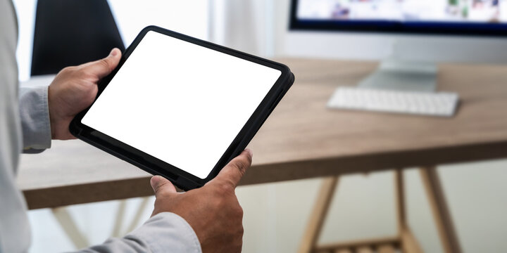 Man hand holding digital tablet touch white screen device isolated screen communication empty space frame mockup, internet touchpad information iPad.