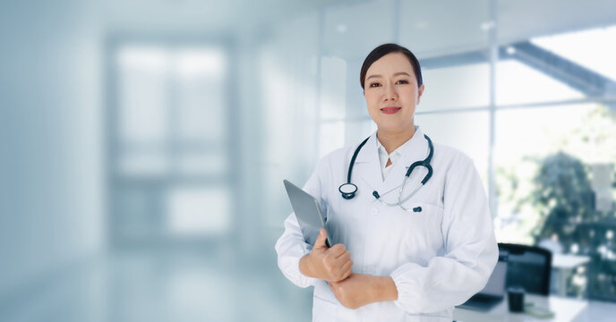 Medicine female doctor using tablet. Medical technology and futuristic concept.