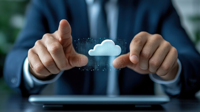 Businessman interacts with digital cloud icon, symbolizing modern technology and data storage. image conveys innovation and connectivity in professional setting