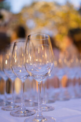 Red and white wine glasses on a beautifully set table, Fine dining and wine, Luxury table setting.