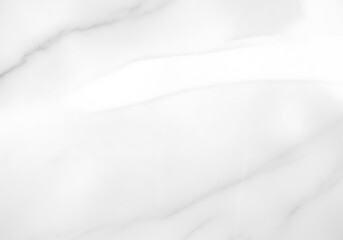 Fototapeta premium Elegant white marble texture with subtle gray veining, featuring a smooth reflective surface and a bright light highlight