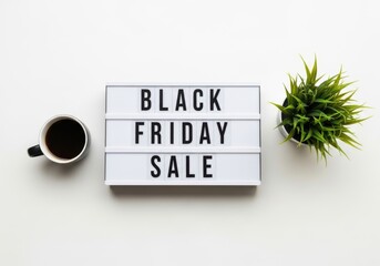 Black Friday Sale text on lightbox with coffee and plant image