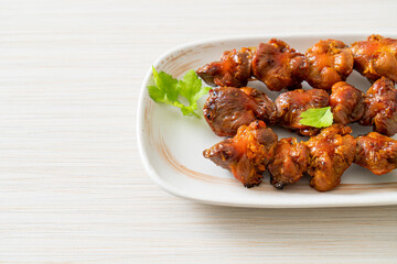 grilled chicken gizzard skewer with herbs and spices