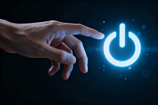 Finger press glowing power button government shutdown concept. Digital technology start stop symbol on dark background