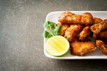 Fried Snapper Belly on white plate