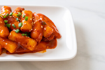 Korean rice cake stick with sausage in spicy sauce - Tteokbokki