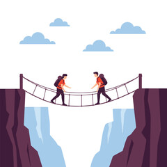 Naklejka premium Two hikers with backpacks carefully making their way across a precarious rope suspension bridge spanning a deep, rocky canyon.