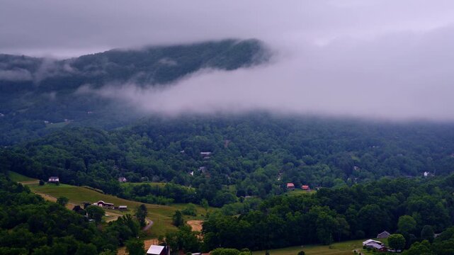 Drone flyover showing a calm, fog-laden valley in the Smokies.
