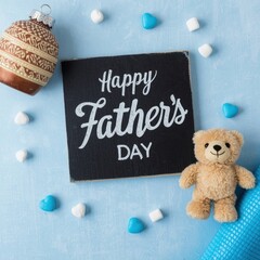 Happy fathers day teddy bear and gift box on blue background