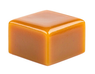 Close-up of a single, perfectly square, glossy caramel candy against black