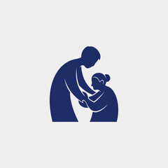 A silhouette of a younger person helping an older person up from a kneeling position.