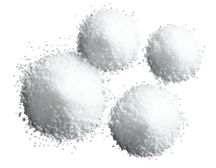 Four white, granular mounds against a stark black background, close-up view