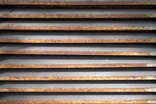 Rusty metal vent grill texture