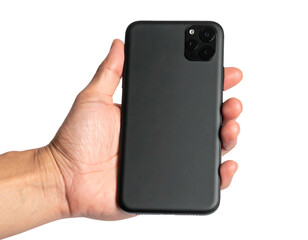 A person's hand holds a black cell phone against a black background. The phone is in a case and has camera lenses