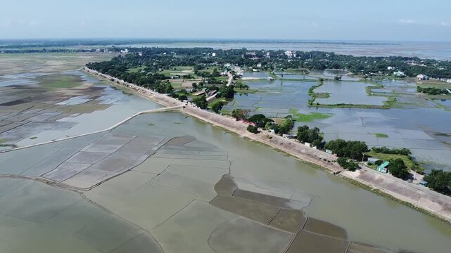 Bangladesh faces flooding and crop damage due to sudden water inflow from India, affecting riverside communities and agricultural lands.Bangladeshi farmers cannot grow crops as floodwaters flood