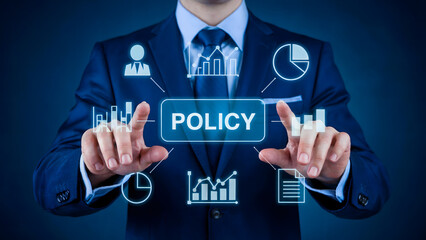 Businessman in suit interacting with policy interface and data visualizations on a blue background