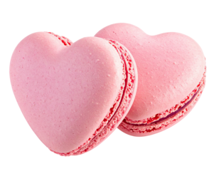 Two pastel pink heart-shaped macarons on a transparent background
