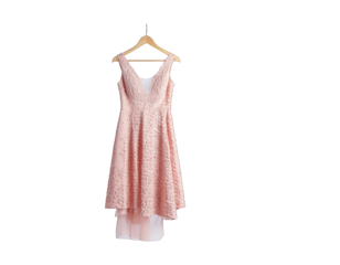 A sleeveless rose gold sequin evening gown with a white underskirt hangs on a wooden hanger against a black background with soft studio lighting
