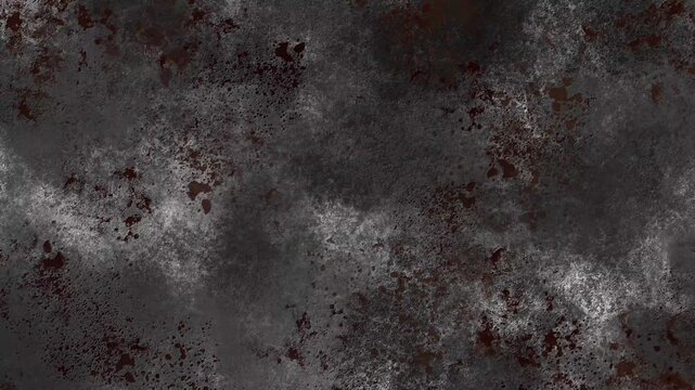 Close-up view of a heavily rusted and corroded dark metal surface with rough texture and reddish-brown patches.