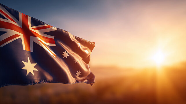 Australian flag waving sunset freedom patriotism national pride sky golden hour wind