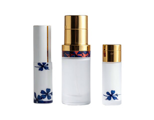 Three ornate glass bottles with gold caps and blue floral designs