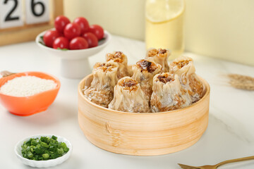 Handmade Chinese Siu Mai Dumplings with Meat and Glutinous Rice in Bamboo Steamer - Traditional Asian Food